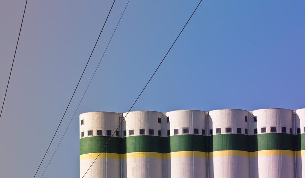Cooling towers at a power facility with transmission lines overhead