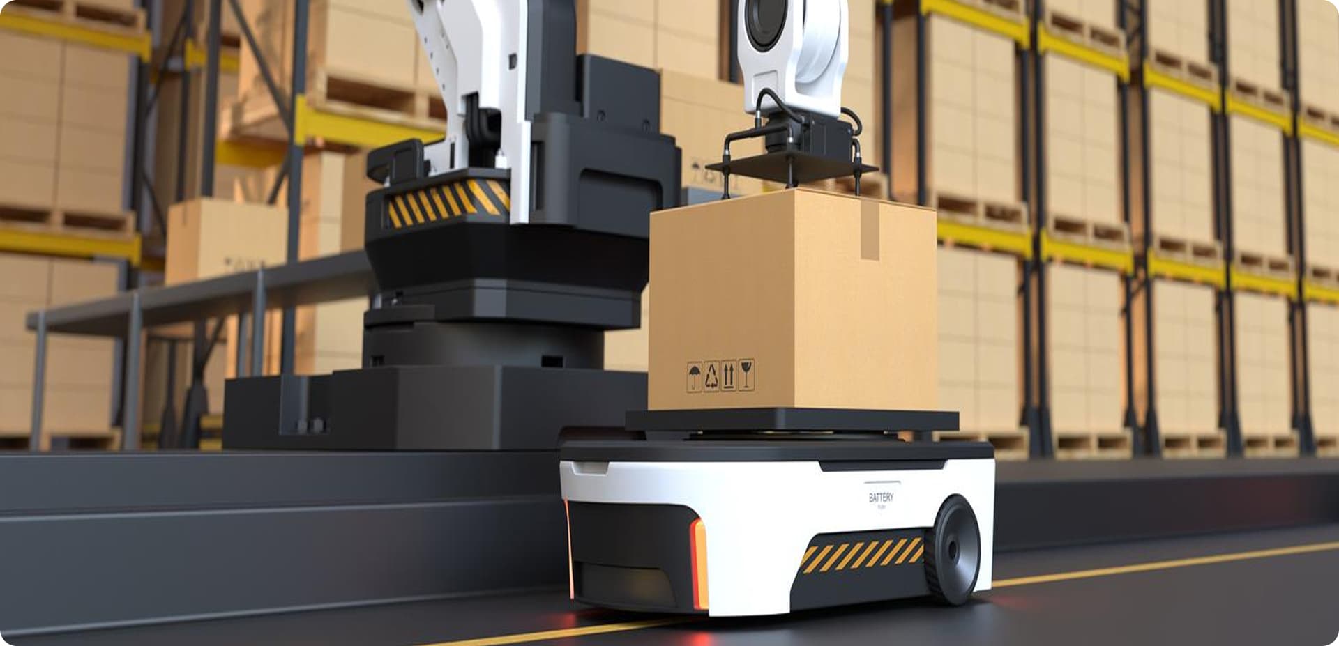 A robot arm moving a box in front of warehouse racking
